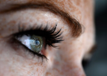 The reflection of an F-16 Fighting Falcon from Spangdahlem Air Base, Germany, appears in the eye of U.S. Air Force Senior Airman Amy Lizauckas, 351st Air Refueling Squadron boom operator from Buffalo, N.Y., during Exercise African Lion May 21, 2015. The annual exercise between the U.S. and the Kingdom of Morocco involves more than 2,500 personnel training to improve interoperability and mutual understanding of each nation's tactics, techniques and procedures. (U.S. Air Force photo by Senior Airman Kate Thornton/Released)