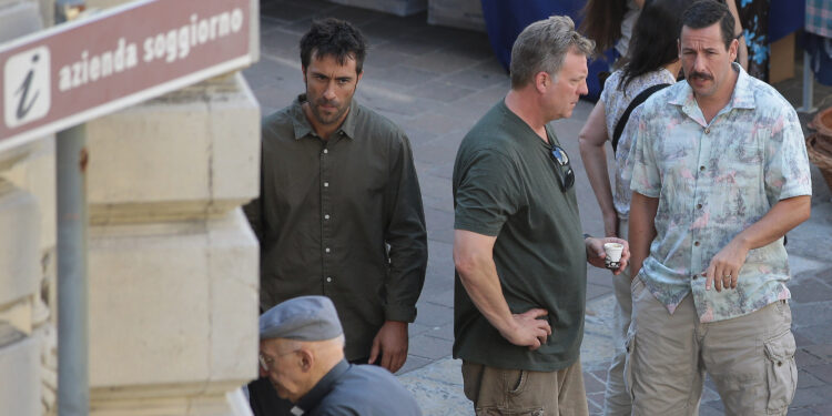 COMO, ITALY - JULY 30:  Adam Sandler is seen on set filming Murder Mystery on July 30, 2018 in Como, Italy.  (Photo by Emilio Andreoli/GC Images) *** Local Caption *** Adam Sandler