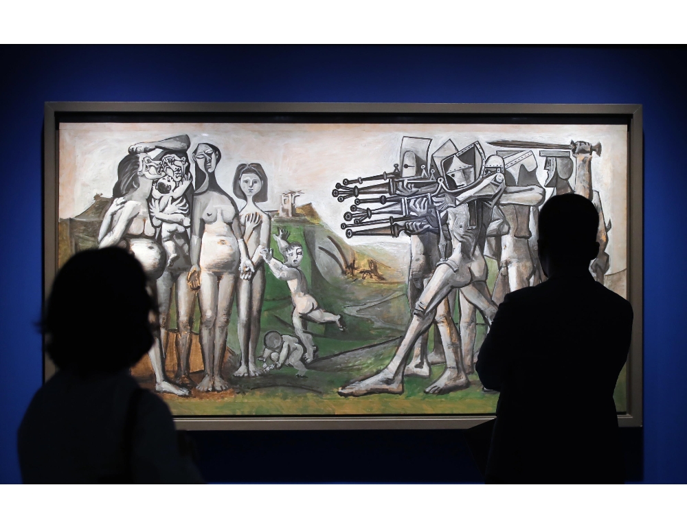 Australia, attivisti per il clima si incollano a quadro Picasso