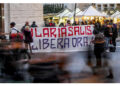 Movimenti con striscione nel centro della città