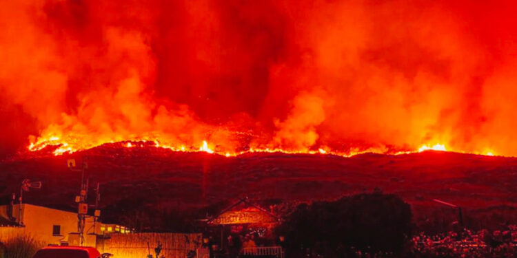 Per la serie sulla Protezione civile. Un rogo durante le riprese