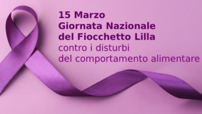 Lotta contro i disturbi del comportamento alimentare: mura di Como illuminate di lilla