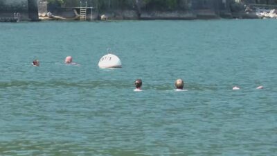 Como, nella spiaggia della tragedia controlli serrati e sirene della guardia costiera contro i tuffi