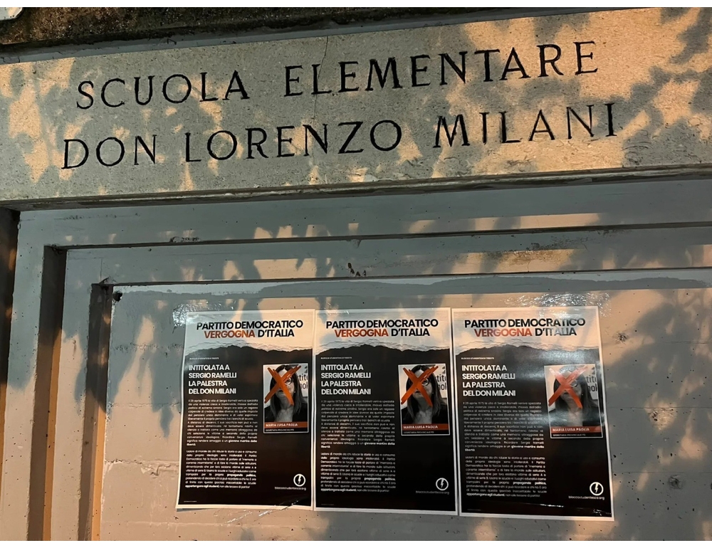 Manifesti Blocco studentesco cancella volto segretaria Pd Trieste con una X